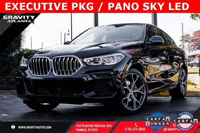 used 2023 BMW X6 car, priced at $56,791