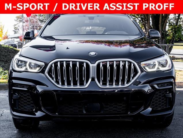 used 2023 BMW X6 car, priced at $56,791