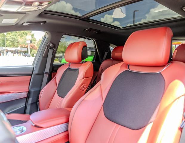 used 2023 Genesis GV70 car, priced at $39,400