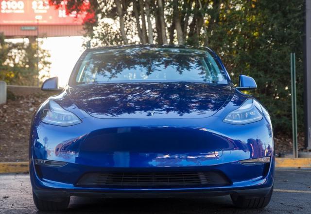 used 2022 Tesla Model Y car, priced at $32,995