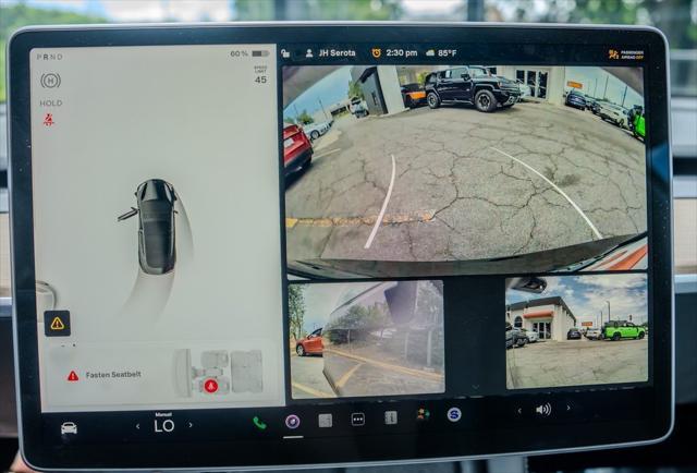 used 2022 Tesla Model 3 car, priced at $29,300