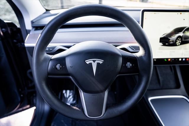 used 2023 Tesla Model Y car, priced at $34,300