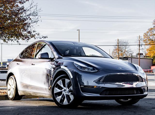 used 2023 Tesla Model Y car, priced at $34,300