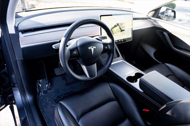 used 2023 Tesla Model Y car, priced at $34,300