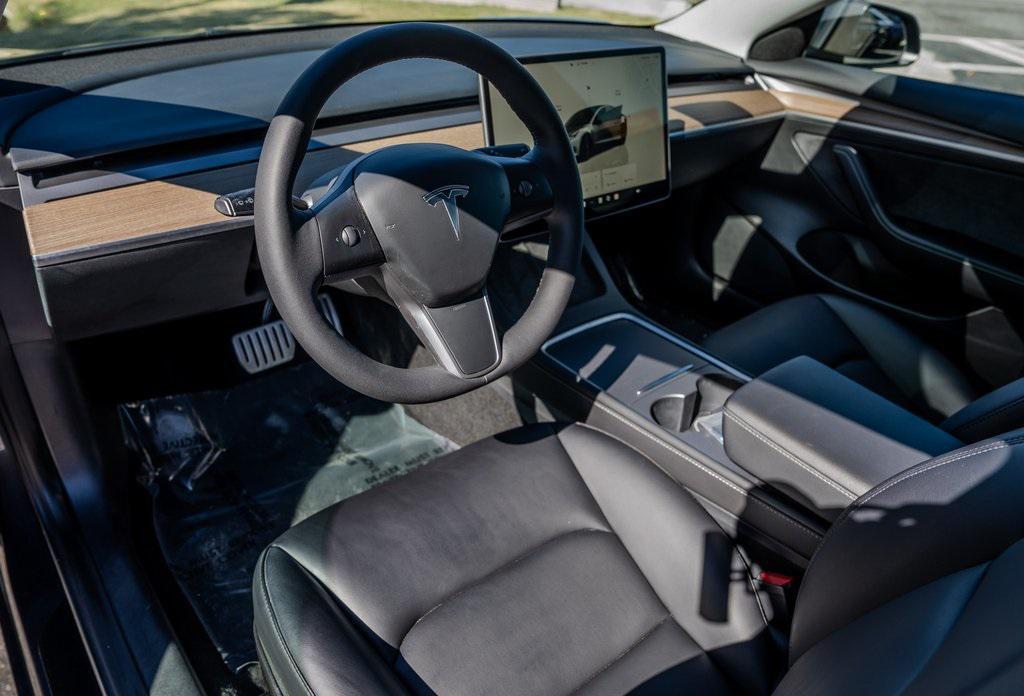 used 2023 Tesla Model 3 car, priced at $32,899