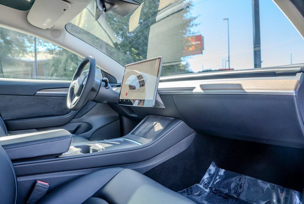 used 2023 Tesla Model 3 car, priced at $32,899