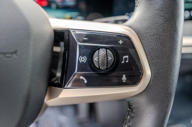 used 2024 BMW iX car, priced at $64,600