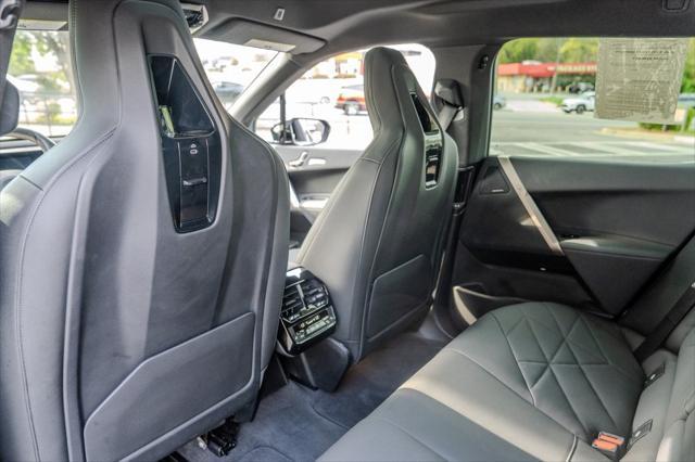 used 2024 BMW iX car, priced at $64,600