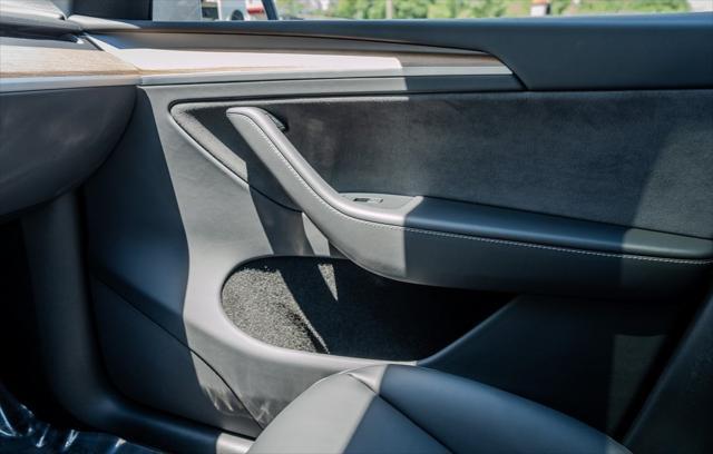 used 2024 Tesla Model Y car, priced at $35,995