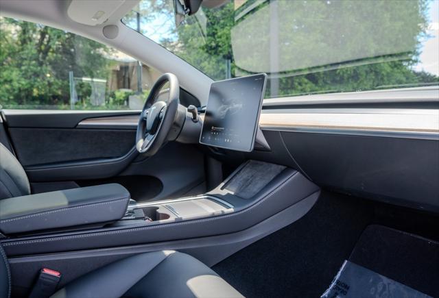 used 2024 Tesla Model Y car, priced at $35,995