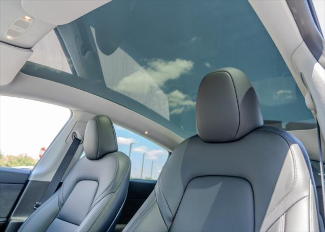used 2024 Tesla Model Y car, priced at $35,995