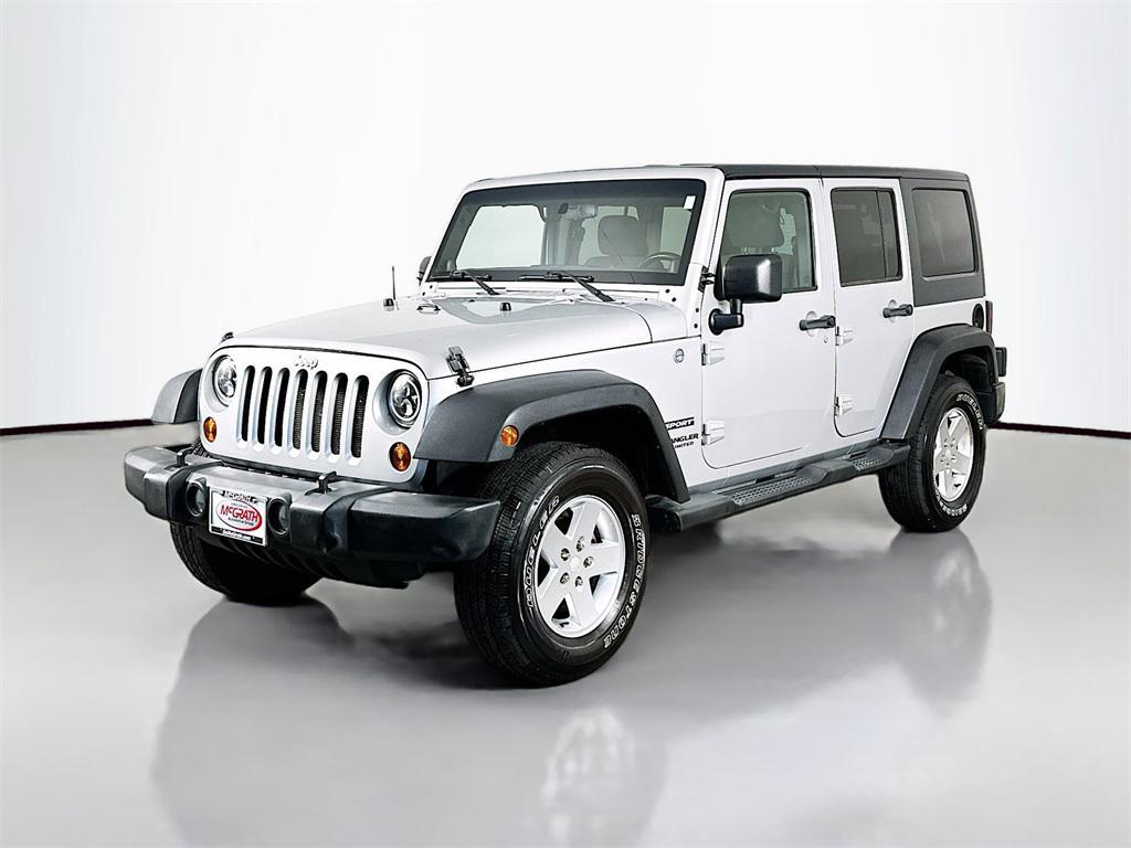 used 2011 Jeep Wrangler Unlimited car, priced at $12,595