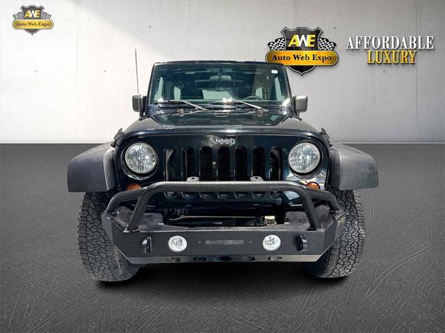 used 2013 Jeep Wrangler Unlimited car, priced at $18,989