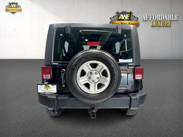 used 2013 Jeep Wrangler Unlimited car, priced at $18,989