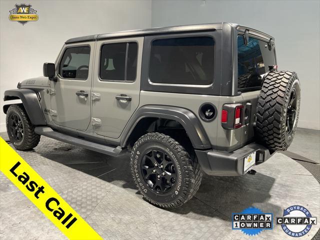 used 2021 Jeep Wrangler Unlimited car, priced at $29,792