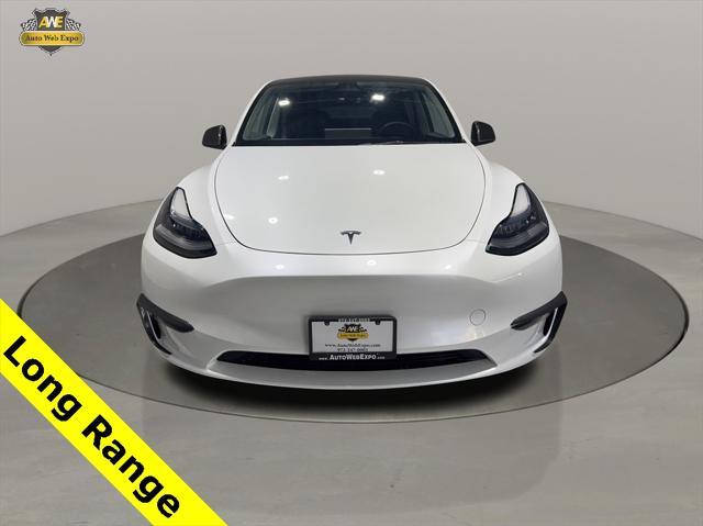 used 2023 Tesla Model Y car, priced at $35,590