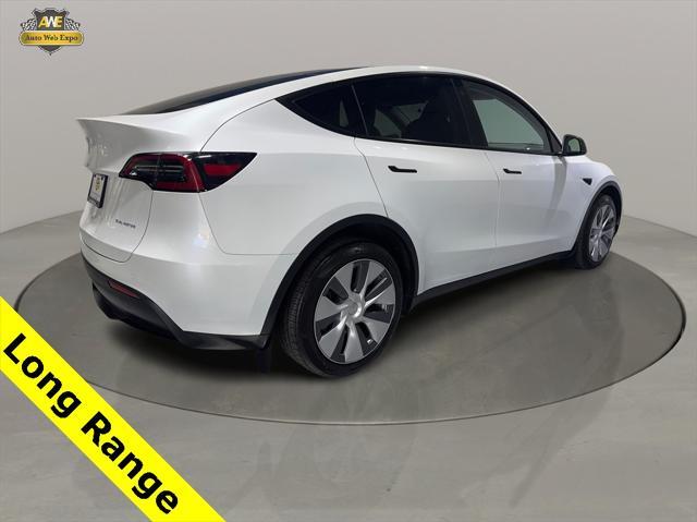 used 2023 Tesla Model Y car, priced at $35,590