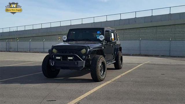 used 2016 Jeep Wrangler Unlimited car, priced at $22,995