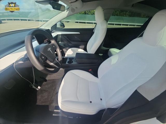 used 2023 Tesla Model 3 car, priced at $29,747