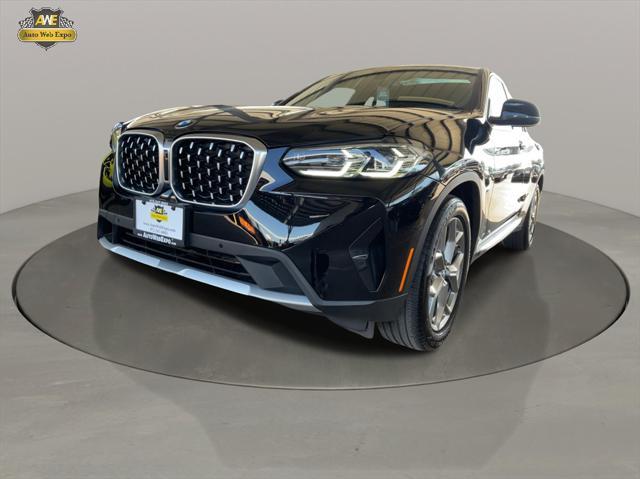 used 2022 BMW X4 car, priced at $38,999