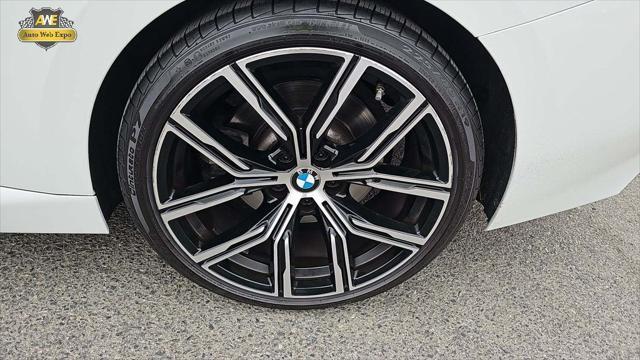 used 2022 BMW 230 car, priced at $30,899
