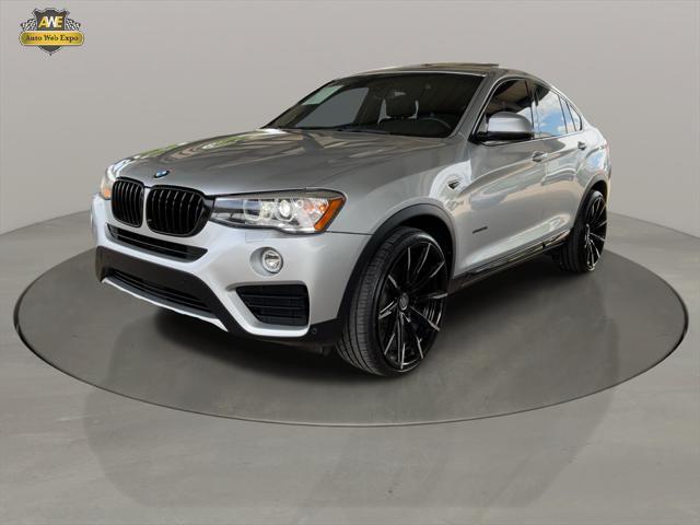 used 2018 BMW X4 car, priced at $24,864
