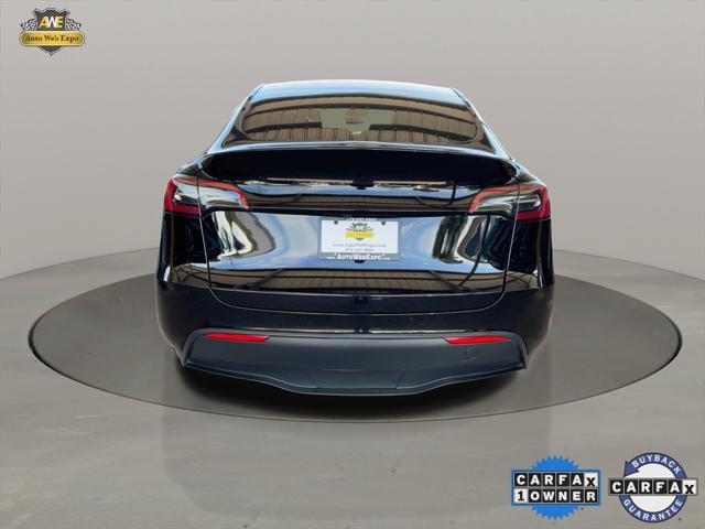 used 2024 Tesla Model Y car, priced at $31,794