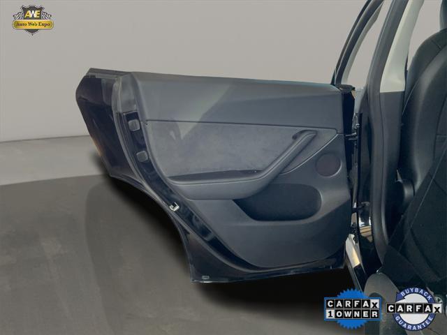 used 2024 Tesla Model Y car, priced at $31,794