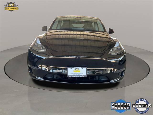 used 2024 Tesla Model Y car, priced at $31,794