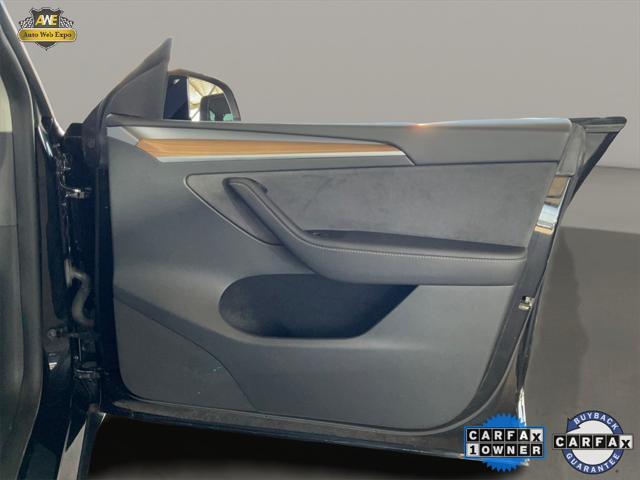 used 2024 Tesla Model Y car, priced at $31,794