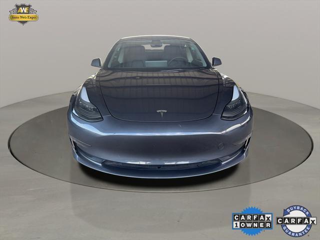 used 2023 Tesla Model 3 car, priced at $30,995