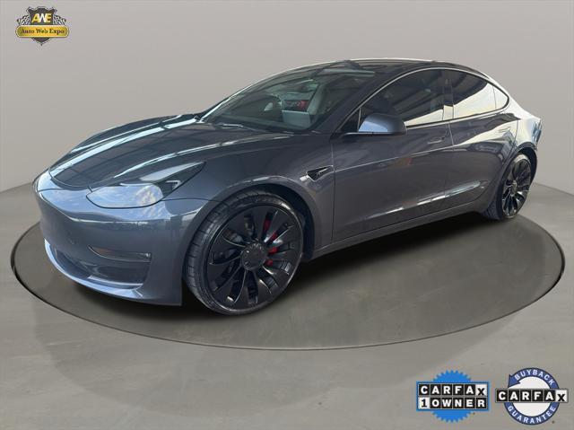 used 2023 Tesla Model 3 car, priced at $30,995