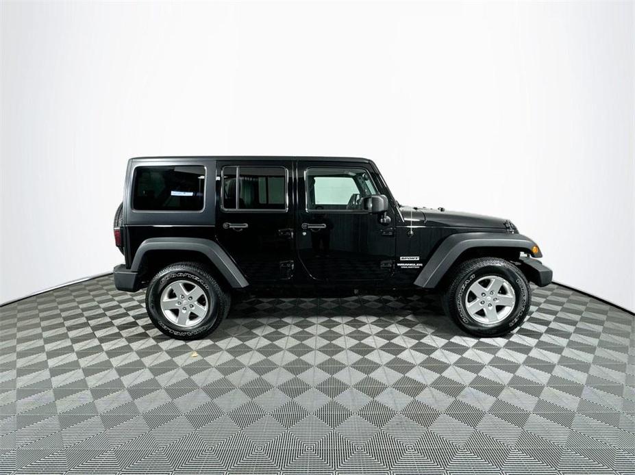 used 2014 Jeep Wrangler Unlimited car, priced at $16,992