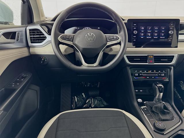 new 2025 Volkswagen Taos car, priced at $32,406