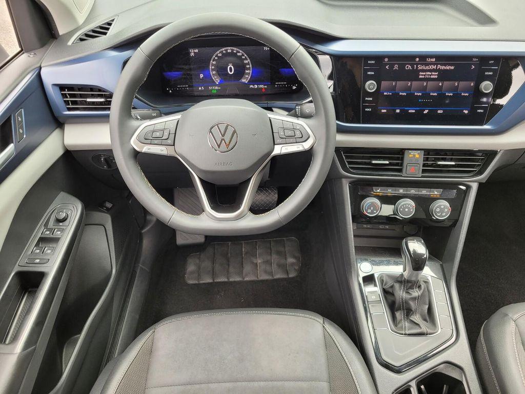 used 2023 Volkswagen Taos car, priced at $18,906