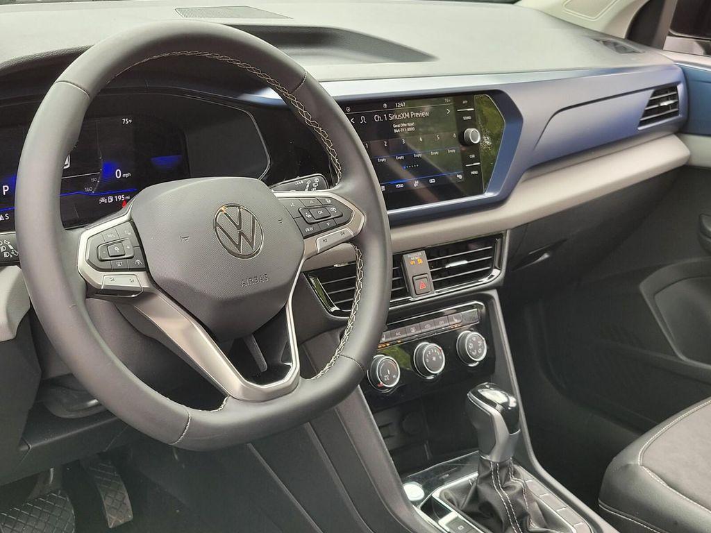 used 2023 Volkswagen Taos car, priced at $18,906
