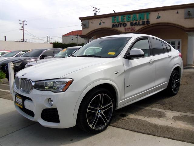 used 2016 BMW X4 car, priced at $14,995