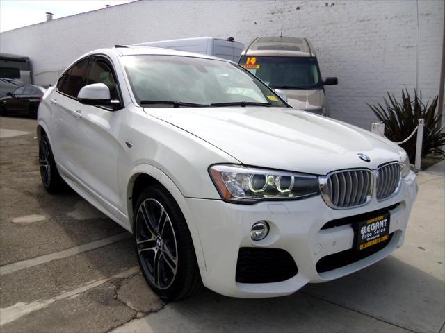 used 2016 BMW X4 car, priced at $14,995