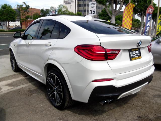 used 2016 BMW X4 car, priced at $14,995