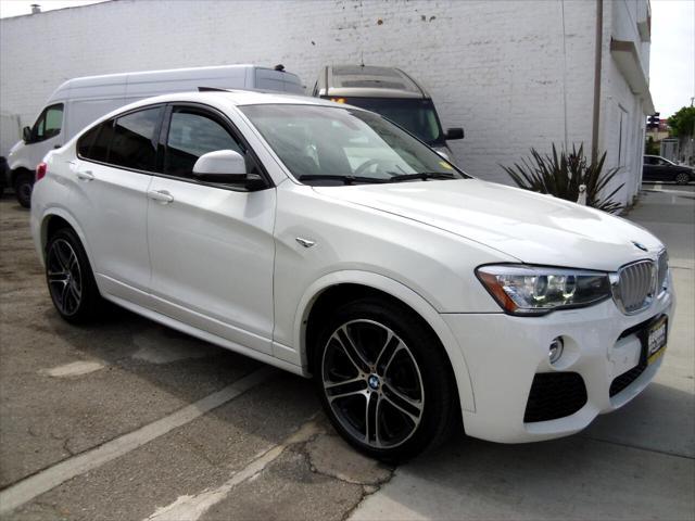 used 2016 BMW X4 car, priced at $14,995