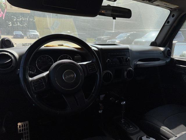 used 2013 Jeep Wrangler Unlimited car, priced at $17,900