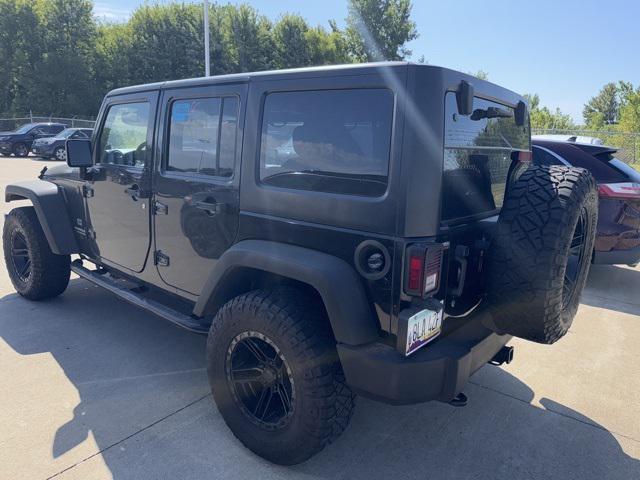 used 2013 Jeep Wrangler Unlimited car, priced at $17,900