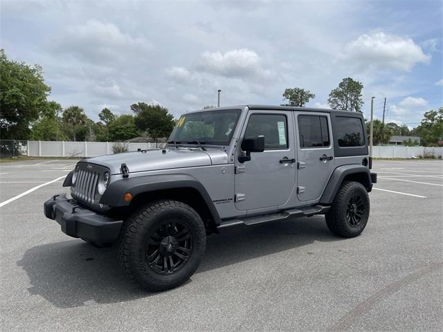 used 2014 Jeep Wrangler Unlimited car, priced at $20,945