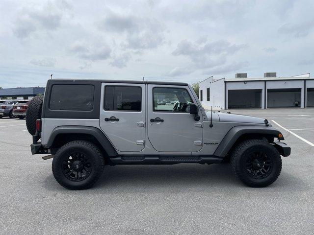used 2014 Jeep Wrangler Unlimited car, priced at $15,899
