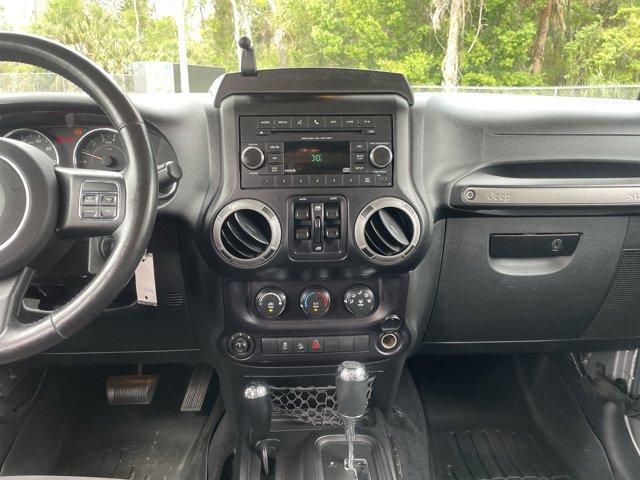 used 2014 Jeep Wrangler Unlimited car, priced at $15,899