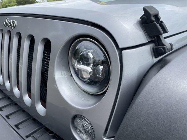 used 2014 Jeep Wrangler Unlimited car, priced at $15,899