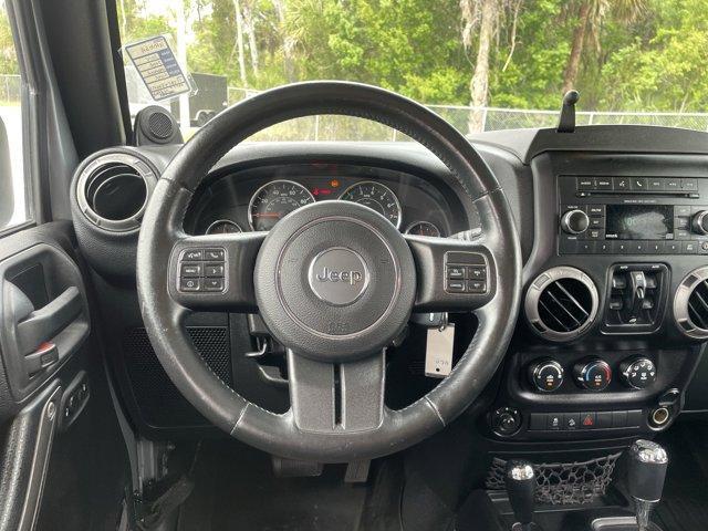 used 2014 Jeep Wrangler Unlimited car, priced at $15,899