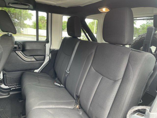 used 2014 Jeep Wrangler Unlimited car, priced at $15,899