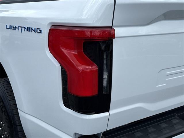 new 2025 Ford F-150 Lightning car, priced at $73,145