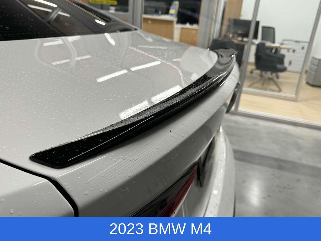 used 2023 BMW M4 car, priced at $63,995